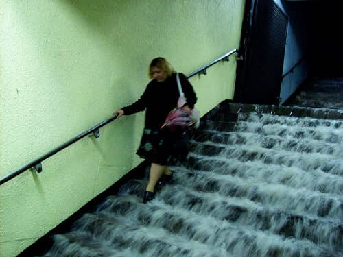 Photo Credit: Isaí Moreno via Compfight woman walking down flooded stairs